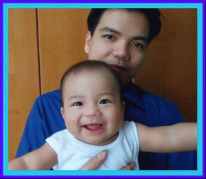 Daddy Ronnie Manicad with Baby Renzo gif